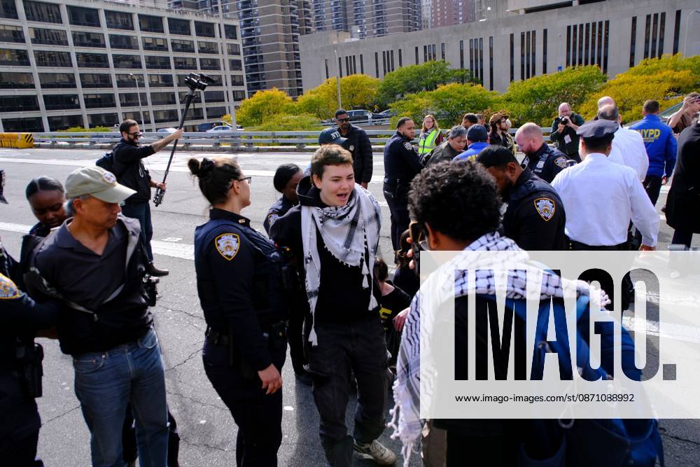 NEW YORK, NY- OCTOBER 28: 13 activists were arrested on the Brooklyn Bridge to demand I.C.E stop shooting New Yorkers on October 28, 2026 in New York City.