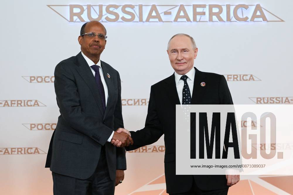 President Vladimir Putin officially greets heads of delegation at Russia-Africa Summit 9276168 28.10.2026 President Vladimir Putin at an official greeting ceremony for heads of delegation at the 3rd Russia-Africa Summit. Left: Chairperson of the African Union Commission Mahmoud Ali Youssouf. Alexandr Kryazhev Sputnik Crediting the source in the following order photographer s name Russia-Africa Summit and Economic and Humanitarian forum host ÑÄhoto agency is mandatory when using the photo Moscow Russia