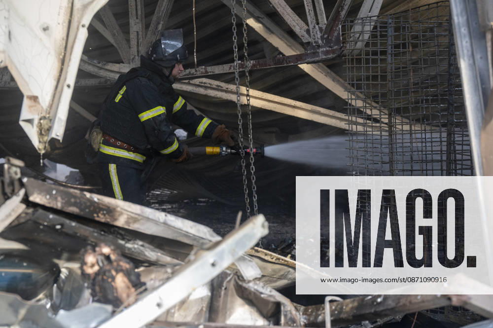 Russian drone strike on postal facility in Kharkiv leaves one dead and four injured KHARKIV, UKRAINE - OCTOBER 28: Emergency personnel work at the scene following a Russian attack on a postal service branch in Kharkiv, Ukraine, on October 28, 2026. Local authorities reported that Russian forces struck the facility around 12:55 p.m. using a Geran-3 attack drone, triggering a fire at the site that resulted in the death of a 38-year-old man and injured four others including a woman. Serhii Masin Anadolu Kharkiv Ukraine. Editorial use only. Please get in touch for any other usage.