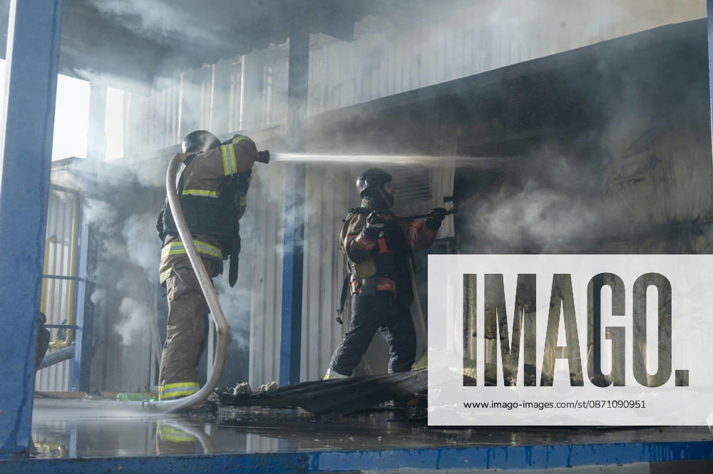 Russian drone strike on postal facility in Kharkiv leaves one dead and four injured KHARKIV, UKRAINE - OCTOBER 28: Emergency personnel work at the scene following a Russian attack on a postal service branch in Kharkiv, Ukraine, on October 28, 2026. Local authorities reported that Russian forces struck the facility around 12:55 p.m. using a Geran-3 attack drone, triggering a fire at the site that resulted in the death of a 38-year-old man and injured four others including a woman. Serhii Masin Anadolu Kharkiv Ukraine. Editorial use only. Please get in touch for any other usage.