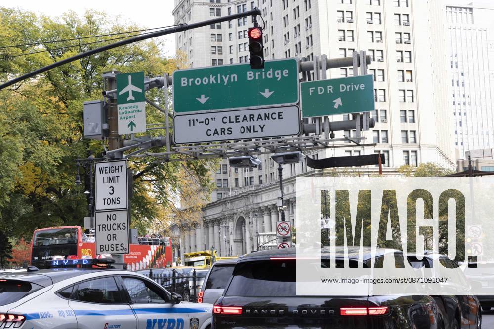 Traffic is backed up entering the Brooklyn Bridge while anti-ICE (U.S. Immigration and Customs Enforcement) demonstrators blockade the roadway on the bridge protesting the continued detainment of O. Belgal, who was shot by federal agents in the Bronx with his 5-yr-old son in the car. The demonstration results in arrests by NYPD. Protesters call for ICE out of New York. New York USA - ZUMAr174 20261028_znp_r174_025