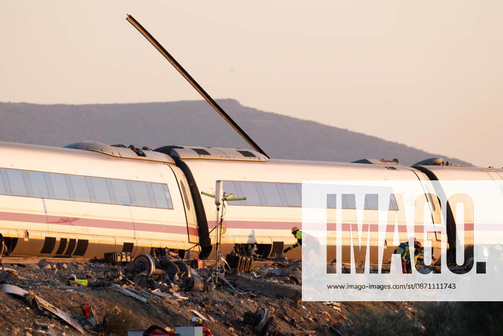 October 28, 2026, Urda, Toledo, Spain: October 28, 2026, Urda, Toledo, Spain: At least 68 people have died and dozens more were injured after two high-speed passenger trains collided near Urda station in the province of Toledo on Wednesday morning, regional authorities confirmed. The catastrophe occurred at approximately 08:53 AM when a state-owned Renfe AVE train struck the rear of a stationary train operated by private carrier Iryo. More than 500 passengers were on board both convoys, which were traveling along the Madrid-Andalusia high-speed corridor. Spanish Transport Minister ü scar Puente stated that the collision followed a safety system failure, after which an inexplicable order was issued - ZUMAd308 20261028_zsp_d308_121