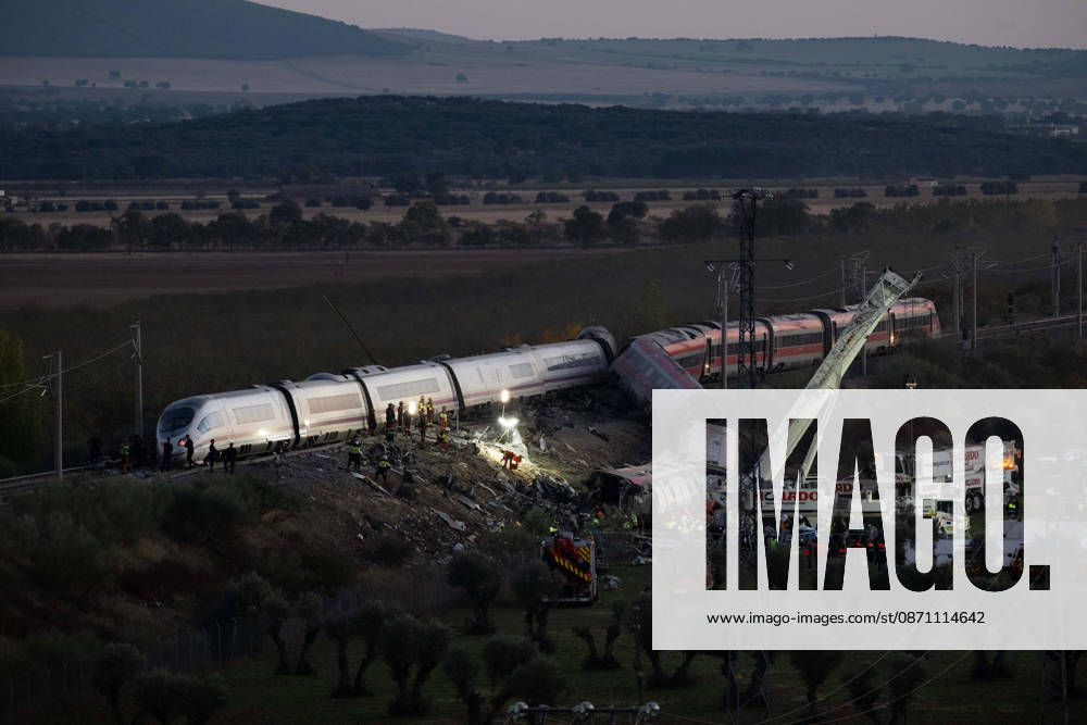 October 28, 2026, Urda, Toledo, Spain: October 28, 2026, Urda, Toledo, Spain: At least 68 people have died and dozens more were injured after two high-speed passenger trains collided near Urda station in the province of Toledo on Wednesday morning, regional authorities confirmed. The catastrophe occurred at approximately 08:53 AM when a state-owned Renfe AVE train struck the rear of a stationary train operated by private carrier Iryo. More than 500 passengers were on board both convoys, which were traveling along the Madrid-Andalusia high-speed corridor. Spanish Transport Minister ü scar Puente stated that the collision followed a safety system failure, after which an inexplicable order was issued - ZUMAd308 20261028_zsp_d308_159