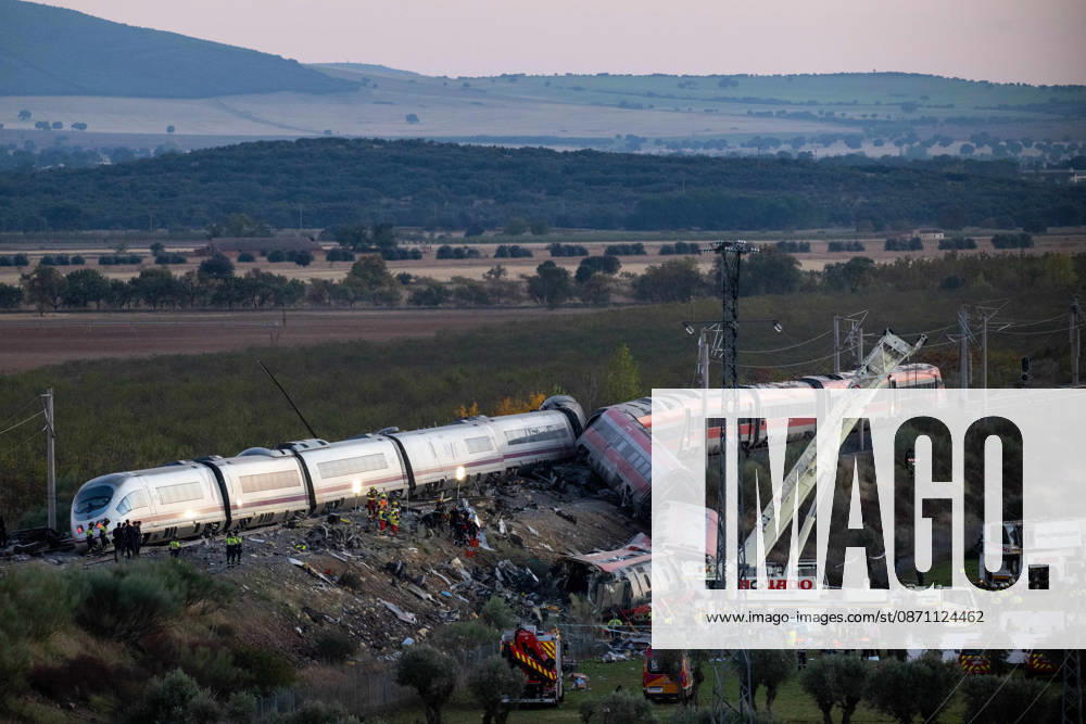 Rescue workers at the deadly train colllision scene as night falls. At least 68 people have died and dozens more were injured after two high-speed passenger trains collided near Urda station in the province of Toledo at 08:53am when a state-owned Renfe AVE train struck the rear of a stationary train operated by private carrier Iryo. More than 500 passengers were on board both trains, which were traveling along the Madrid-Andalusia high-speed corridor. Spanish Transport Minister Puente stated that the collision followed a safety system failure. Urda Spain - ZUMAd308 20261028_zsp_d308_155