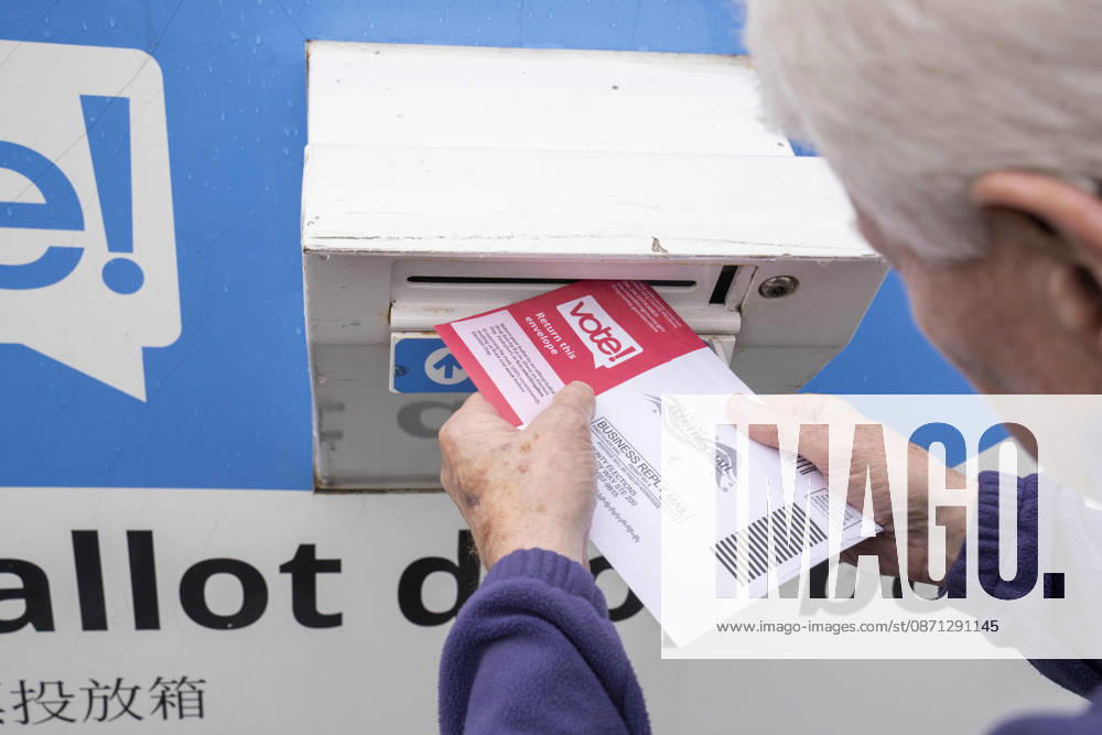A man places his ballot in a ballot drop box in the parking lot of the King County Elections office in Renton, Washington, USA, on Thu., Oct. 29, 2026. Approximately 98% of votes cast in Washington state are mail-in ballots. Renton USA - ZUMAb344 20261029_znp_b344_017
