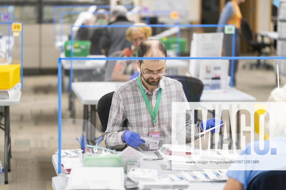 Workers open mail-in ballots in a secure room for the 2026 mid-term election at the King County Elections office in Renton, Washington, USA, on Thu., Oct. 29, 2026. Approximately 98% of votes cast in Washington state are mail-in ballots. Renton USA - ZUMAb344 20261029_znp_b344_003