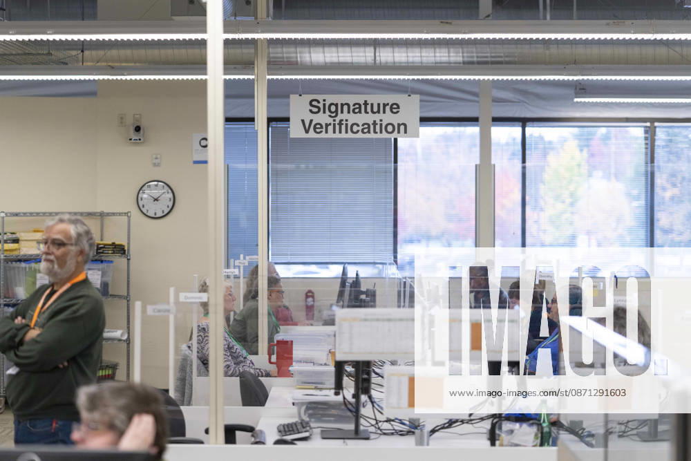 Workers in the Signature Verification look at ballot signatures in a secure room as 2026 mid-term election ballots are opened and counted at the King County Elections office in Renton, Washington, USA, on Thu., Oct. 29, 2026. Approximately 98% of votes cast in Washington state are mail-in ballots. Renton USA - ZUMAb344 20261029_znp_b344_006
