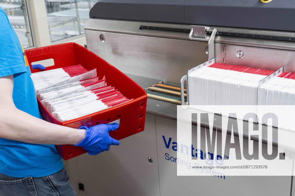 Envelopes filled with voted ballots are placed into a machine to open the envelopes in a secure room as 2026 mid-term election ballots are opened and counted at the King County Elections office in Renton, Washington, USA, on Thu., Oct. 29, 2026. Approximately 98% of votes cast in Washington state are mail-in ballots. Renton USA - ZUMAb344 20261029_znp_b344_041