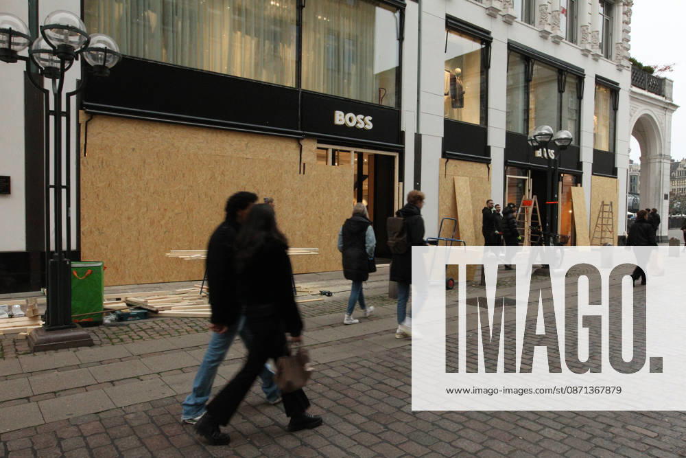 Hugo Boss store on Neuer Wall. The store s windows were barricaded with wooden panels out of fear of vandalism during Saturday s Gen Z demonstration in downtown Hamburg. Hamburg s Old Town