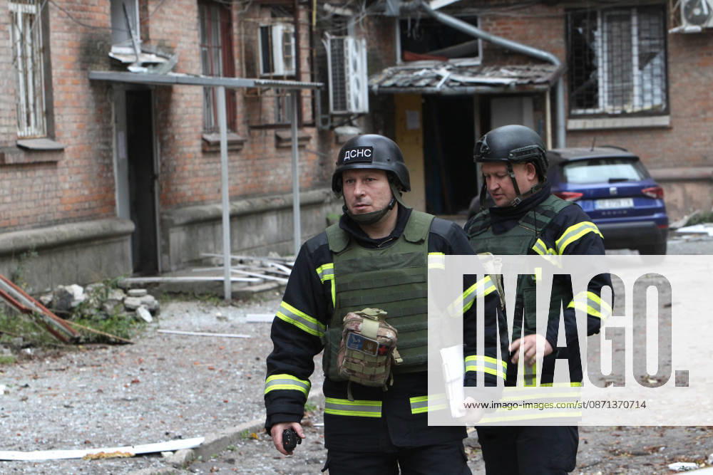 Rescuers work at an apartment block on Oleksandra Polia Avenue damaged by a Russian drone strike in Dnipro, Ukraine, on October 30, 2026. The Russian attack damaged at least five residential high-rise buildings and a school. More than 300 windows were shattered in the strike. (Photo by Mykola Miakshykov Ukrinform) Russian attack damages residential buildings and school in Dnipro