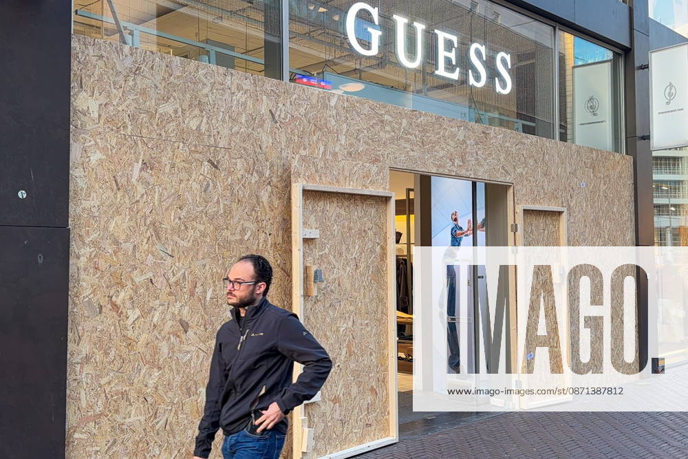 NETHERLANDS, THE HAGUE - OCTOBER 30, 2026: A view of a boarded up Guess clothing boutique amid fears of looting over calls for a youth protest. On 29 October 2026, the media outlet GeenStijl reported about calls to stage riots on 31 October, in the wake of recent unrest in France, and threats against the Dutch royal family circulating across Dutch social media platforms. Natalya Blinova TASS 100232557