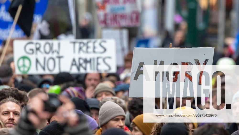 Gen Z Regelt: Hundreds March Through the Old Town and Südstadt, Nuremberg, October 31, 2026. Participants in the Gen Z Regelt initiative hold up signs reading Angry and Grow Trees, Not Armies. The nationwide initiative calls for more funding for education and healthcare, more climate protection, and affordable living, 20261031-1V9A3917-M4000