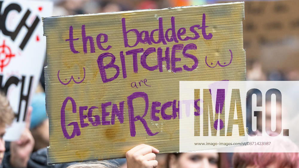 Gen Z Takes Charge: Hundreds March Through the Old Town and Südstadt, Nuremberg, October 31, 2026: At a rally organized by the Gen Z Regelt initiative, a protester holds up a cardboard sign reading The baddest BITCHES are AGAINST THE RIGHT. The nationwide initiative is calling for 20261031-1V9A3952-M4000