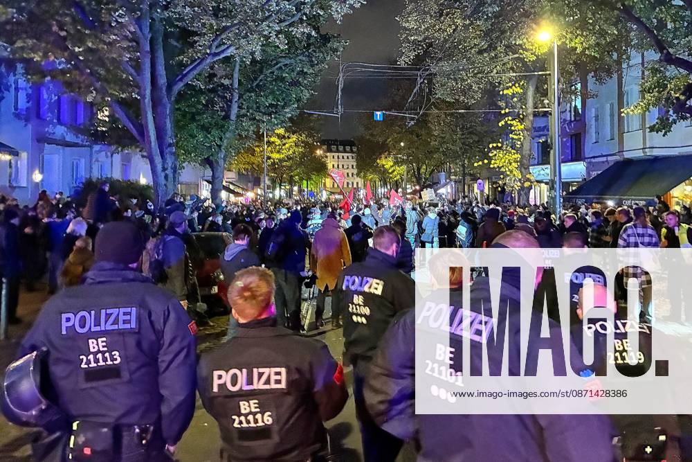 Berlin, Germany, October 31, 2026: A protest organized by Gen Z regelt gathers demonstrators near Rosenthaler Platz around 6:00 p.m., apparently including members of the Black Block. The original organizers of Gen Z regelt have distanced themselves from this demonstration. Firecrackers and flares are being set off; police are on the scene.