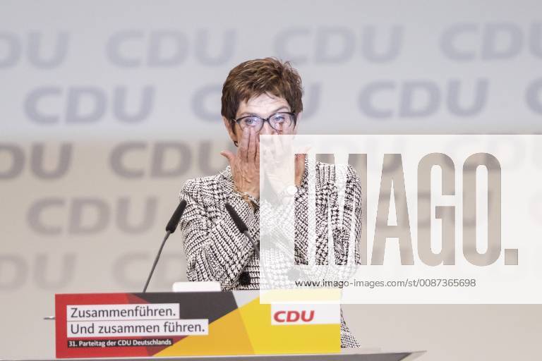 The newly elected CDU chairperson Annegret Kramp Karrembauer C greets the applauding delegate after the announcement of the election results at the 31 CDU Germany party conference at the Hamburg fair on 7 December 2018 31 CDU party conference