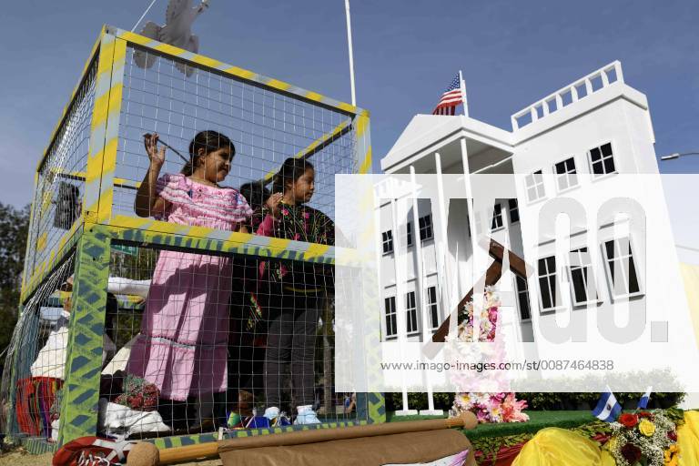 Los Angeles, California, United States - A float containing children in a cage and a replica of the White House, in opposition to the Trump administration s detention of illegal immigrants, takes part in the procession honoring Our Lady of Guadalupe in Los Angeles, California on December 9, 2018. Los Angeles United States - ZUMAn230 20181209_zaa_n230_553