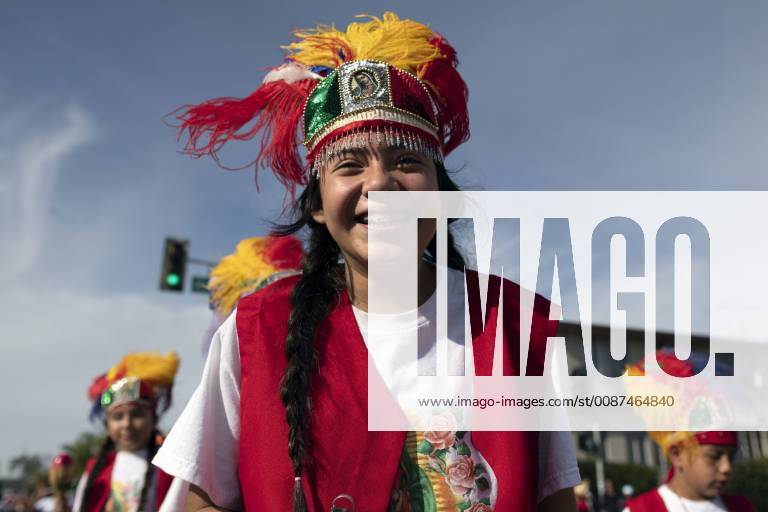 Los Angeles, California, United States - People take part in the 87th Annual Procession and Mass in honor of Our Lady of Guadalupe in Los Angeles, California on December 9, 2018. The Catholic procession is the oldest religious procession in Los Angeles and celebrates the apparition of the Virgin Mary in Mexico in 1531. Los Angeles United States - ZUMAn230 20181209_zaa_n230_555