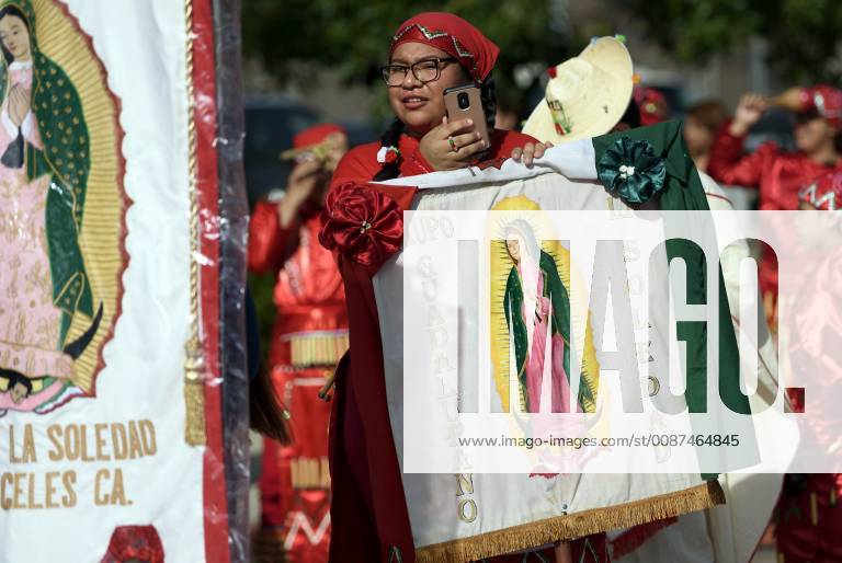 Los Angeles, California, United States - People take part in the 87th Annual Procession and Mass in honor of Our Lady of Guadalupe in Los Angeles, California on December 9, 2018. The Catholic procession is the oldest religious procession in Los Angeles and celebrates the apparition of the Virgin Mary in Mexico in 1531. Los Angeles United States - ZUMAn230 20181209_zaa_n230_560
