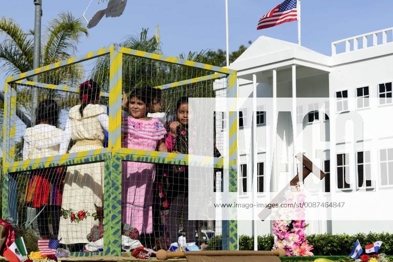 Los Angeles, California, United States - A float with children in a cage and a replica of the White House, in opposition to the Trump administration s detention of illegal immigrants, takes part in the procession honoring Our Lady of Guadalupe in Los Angeles, California on December 9, 2018. Los Angeles United States - ZUMAn230 20181209_zaa_n230_562