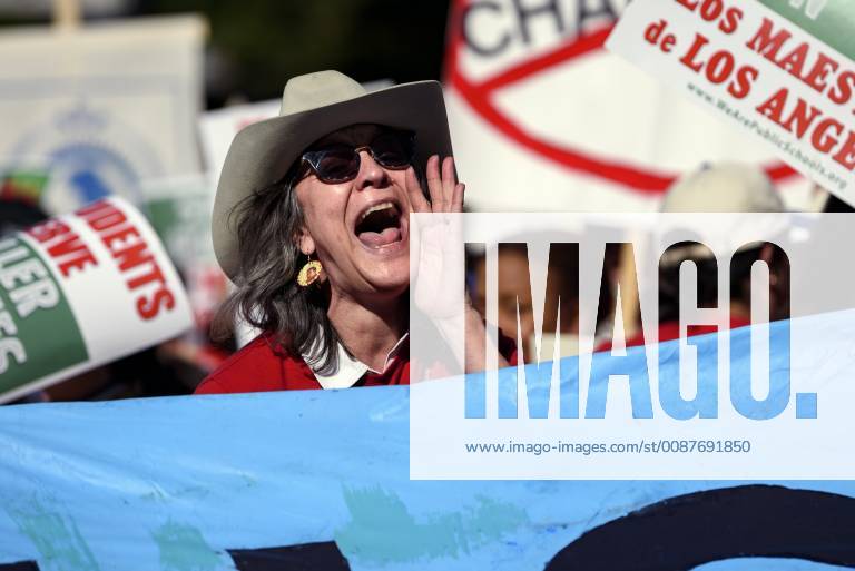 Los Angeles, California, United States - Teachers and supporters of public education march against education funding cuts during the March for Public Education in Los Angeles, California on December 15, 2018. The rally, organized by United Teachers Los Angeles, drew thousands of educators who demanded wage increases and smaller class sizes. Los Angeles United States - ZUMAn230 20181215_zaa_n230_881