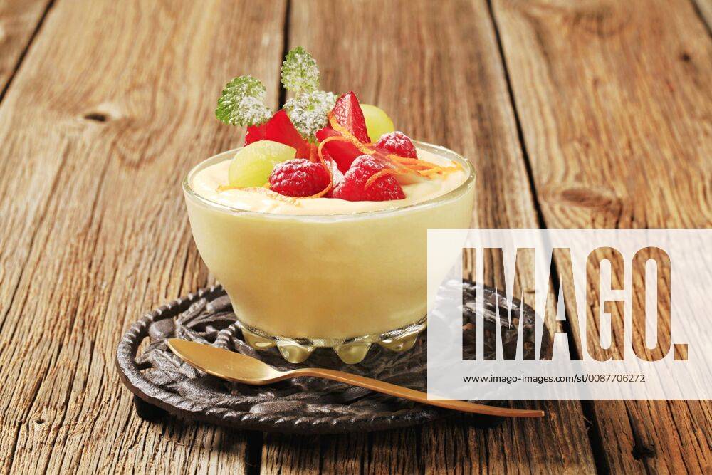 Bowl of creamy pudding with fresh fruit