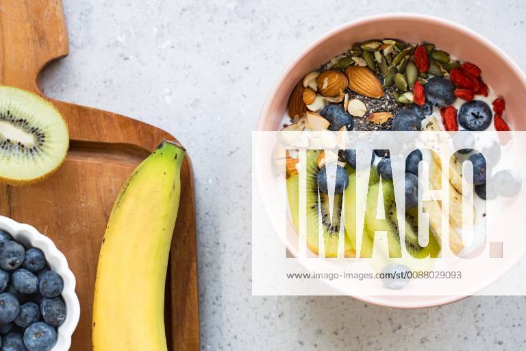 Varieties of fruits and nuts on Greek yogurt