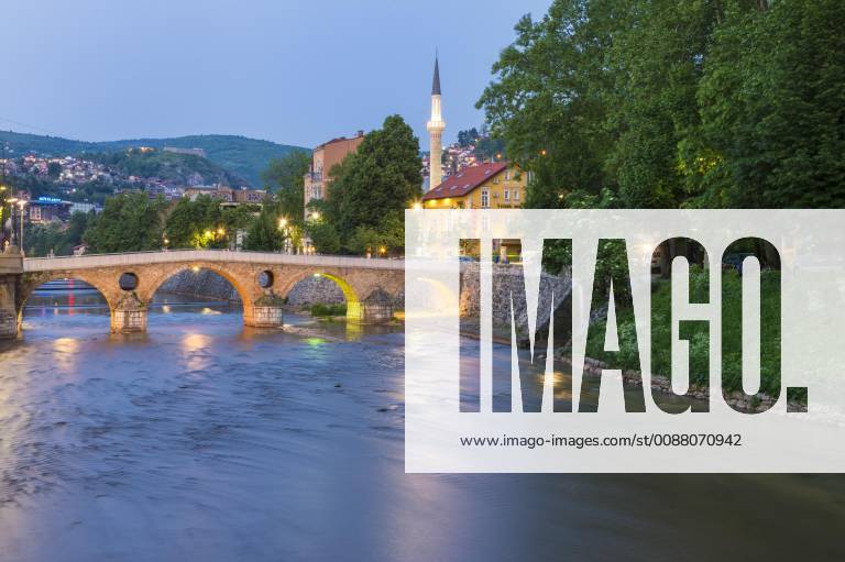 Latin bridge over the Miljacka River at sunset Sarajevo Bosnia and Herzegovina Europe