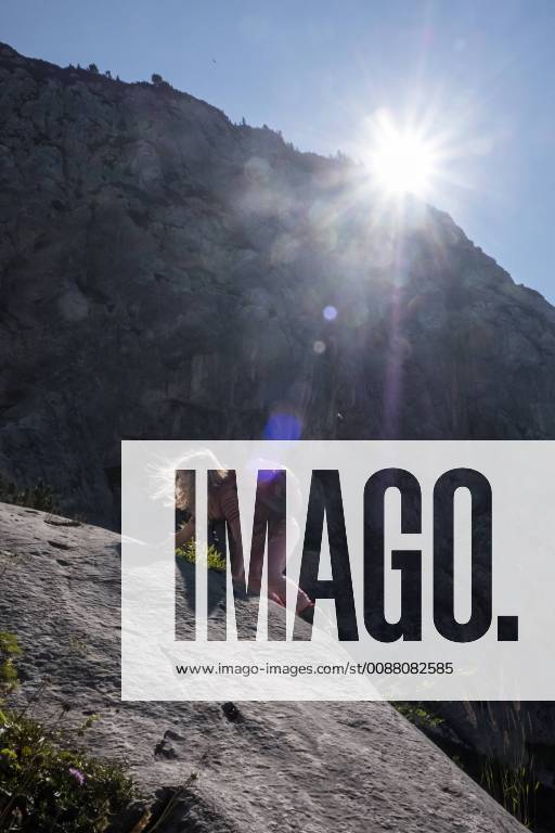 Austria, Ausseer Land, Girl climbing on rocks in the mountains model released Symbolfoto HAMF00386