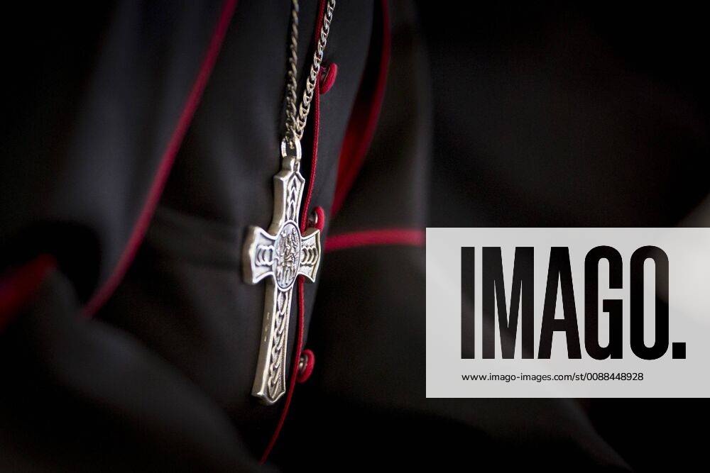 A cross hangs around the neck of an archbishop in Berlin 14 01 2019 Berlin Germany