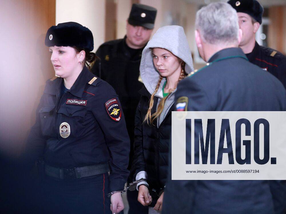 MOSCOW, RUSSIA – JANUARY 19, 2019: Belarusian model Anastasia Vashukevich (C) also known as Nastya Rybka escorted by police officers for a hearing at Moscow s Nagatinsky District Court. Earlier Vashukevich was detained at Moscow s Sheremetyevo Airport after being deported from Thailand for soliciting and conspiracy. Sergei Fadeichev TASS TS09E422