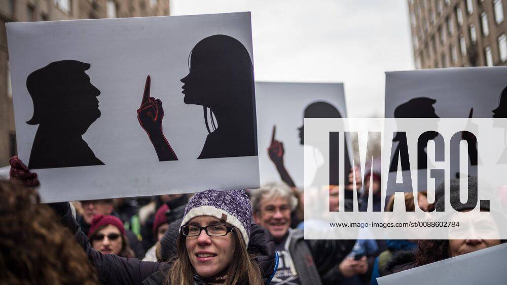 KW03 Protesters hold signs as they participate in the The Women s March in New York City on January 19, 2019. For the last two years in the middle of January between 3 and 4 million people have massed in the streets of the United States in an outpouring of disappointment with the Trump administration. NYP20190119124 STEVExFERDMAN