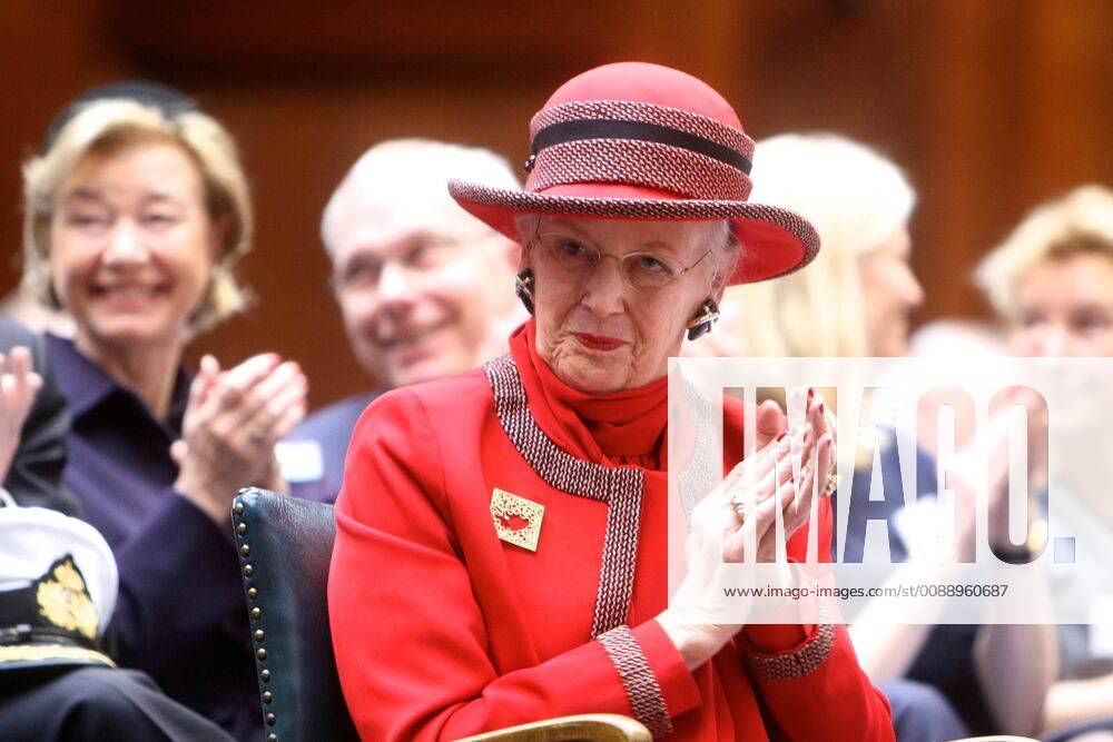Denmark Queen Margrethe during the Royal Danish Farmers Association s 250th anniversary at Axelborg in Copenhagen. She handed out a silver cup to professor and former supervisor Niels Kaergaard and Carl Aage Pedersen, who is chief consultant at Seges.