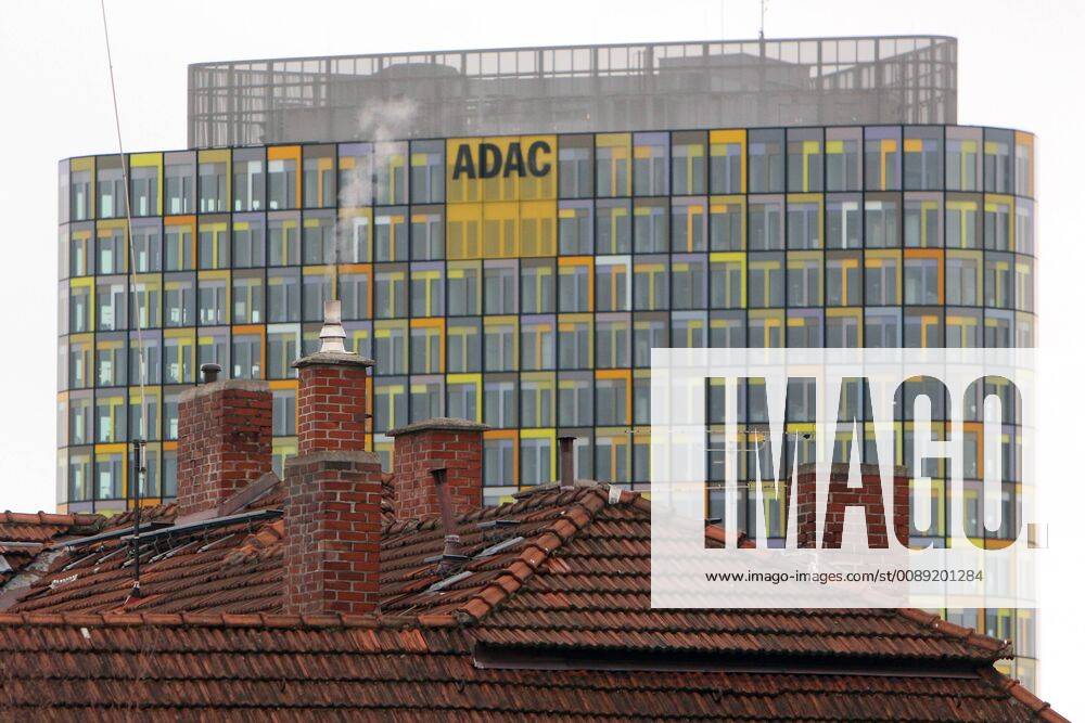 Smoking chimneys in front of the headquarters of the ADAC Allgemeiner Deutscher Automobil Club in Munich Bavaria Germany