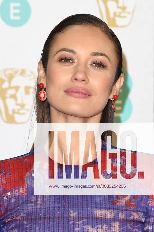 Olga Kurylenko attends the EE British Academy Film Awards at The Royal Albert Hall in London FEBRUARY 10th 2019 PTYx19517