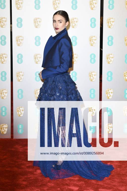 Lily Collins attends the EE British Academy Film Awards at The Royal Albert Hall in London FEBRUARY 10th 2019 PTYx19517