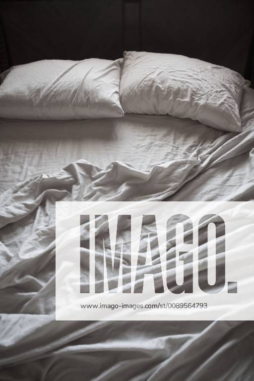 Unmade bed with white sheets Unmade bed with white sheets,Fountain Hills, Arizona, USA 47284