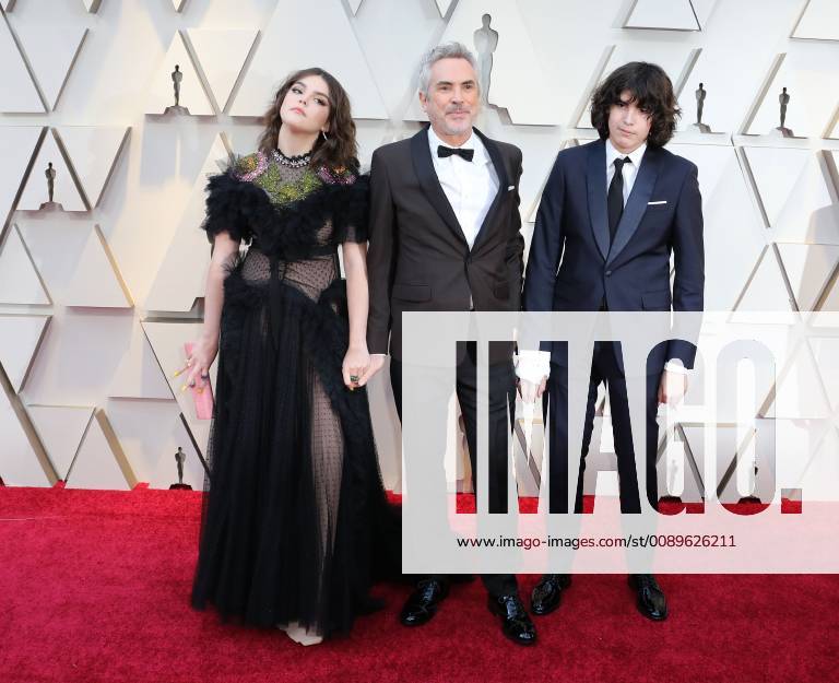Mexican director Alfonso Cuaron (C) and his children Olmo Teodoro (R) and Tess Bu (L) arrive at the red carpet of the 91th Academy Awards, in Hollywood, California, United States, 24 February 2019. 91st Academy Awards in Hollywood !ACHTUNG: NUR REDAKTIONELLE NUTZUNG!