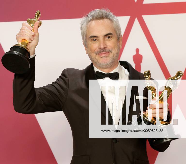 Alfonso Cuaron, winner of Best Foreign Language Film, Best Director and Best Cinematography for Roma, appears backstage with his Oscars during the 91st annual Academy Awards at Loews Hollywood Hotel in the Hollywood section of Los Angeles on February 24, 2019. LAP20190224756 JOHNxANGELILLO