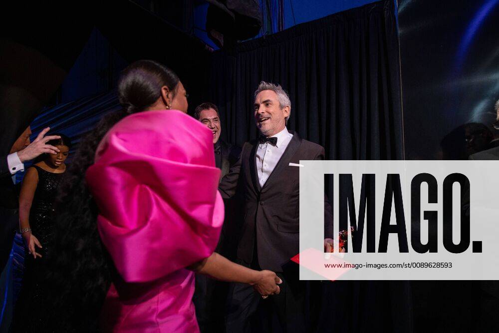 Alfonso Cuaron of Mexico poses backstage with Angela Bassett and Javier Bardem with the Oscar for best foreign language during the live ABC Telecast of The 91st Oscars at the Dolby® Theatre in Hollywood, CA on Sunday