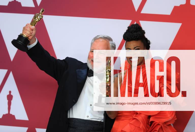 (190225) -- LOS ANGELES, Feb. 25, 2019 (Xinhua) -- Hannah Beachler (R) and Jay Hart pose for photos after winning the Best Production Design award for Black Panther in the press room during the 91st Academy Awards ceremony, or the Oscars, held at the Dolby Theatre in Los Angeles, the United States, on Feb. 24, 2019. (Xinhua Li Ying) U.S.-LOS ANGELES-OSCARS-BEST PRODUCTION DESIGN