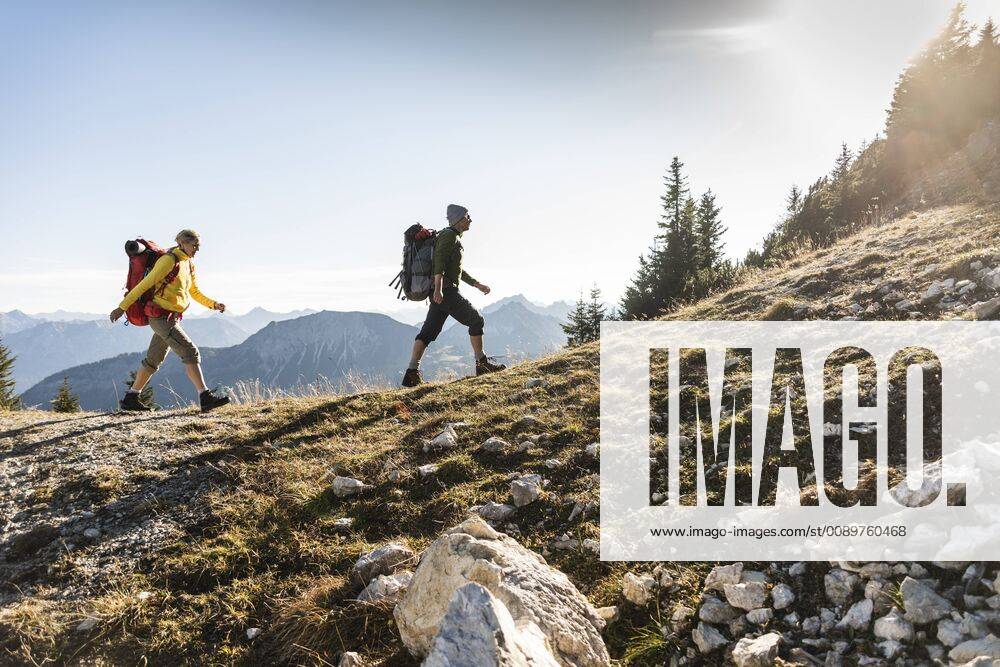 Couple hiking in the Austrian mountains model released Symbolfoto UUF15987