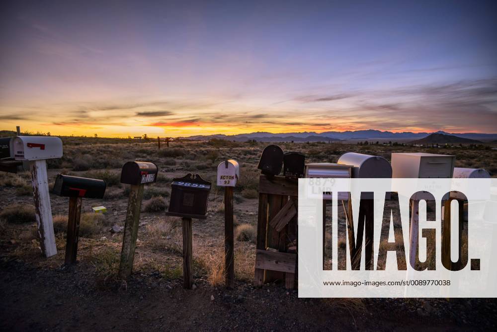 Sunset post boxes at the roadside Historic Route 66 Antares Walapai Kingman Arizona USA North America