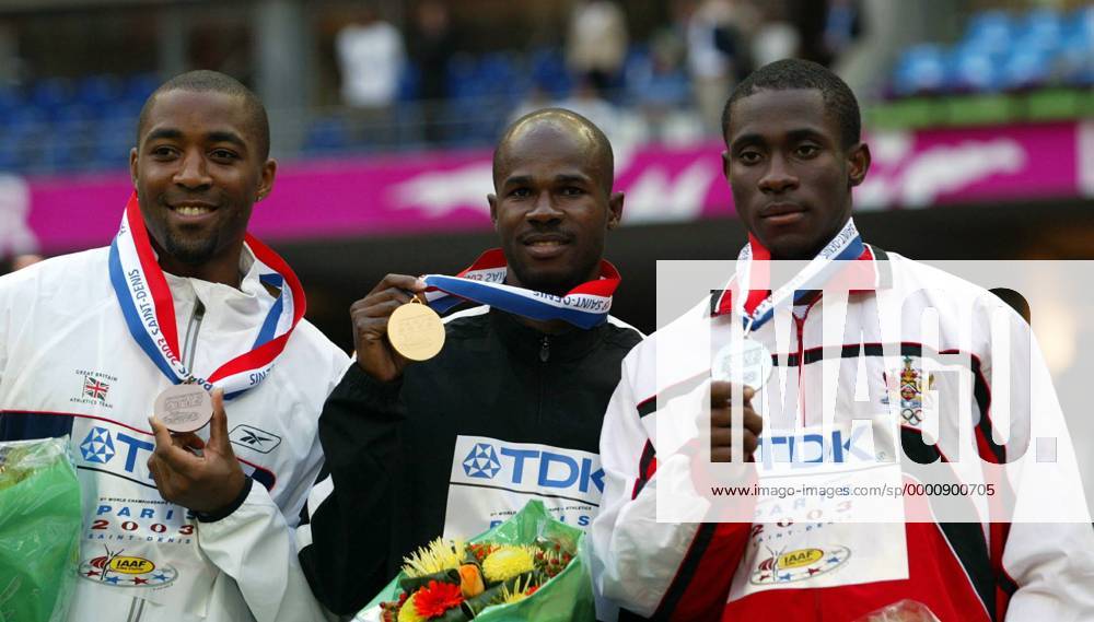 Siegerehrung 100m v.li.: Darren Campbell (Großbritannien), Weltmeister Kim Collins (Saint Kitts und Nevis) und Darrel Brown (Trinidad und Tobago) Leichtathletik WM Herren Weltmeisterschaft 2003, Gruppe Paris Freude,