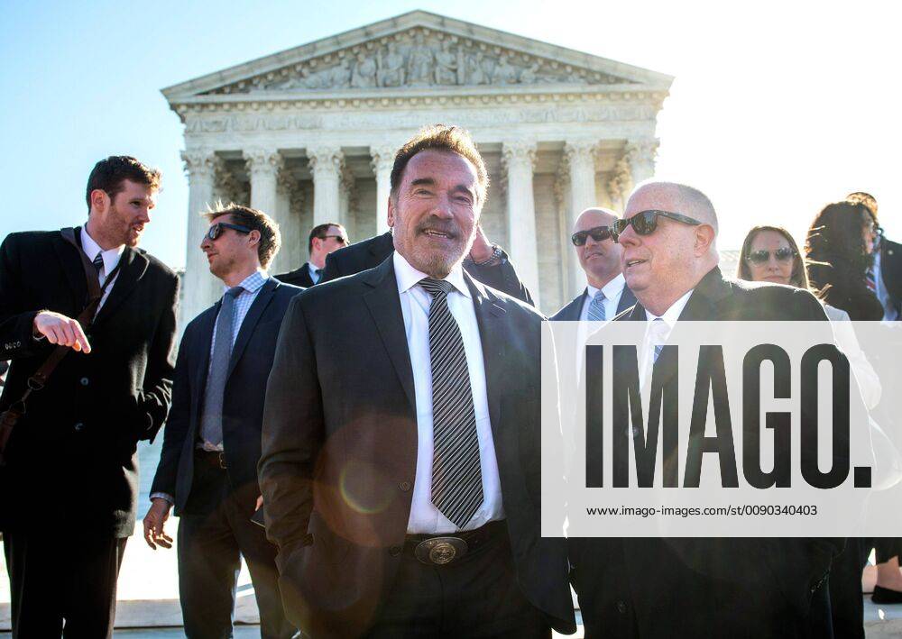 Former Gov. Arnold Schwarzenegger, R-Calif., (L), talks to Gov. Larry Hogan, R-MD, at a press conference on ending gerrymandering and fair election maps, outside of the Supreme Court in Washington, D.C. on March 26, 2019. The high court is hearing arguments on two gerrymandering cases today. WAP20190326341 KEVINxDIETSCH