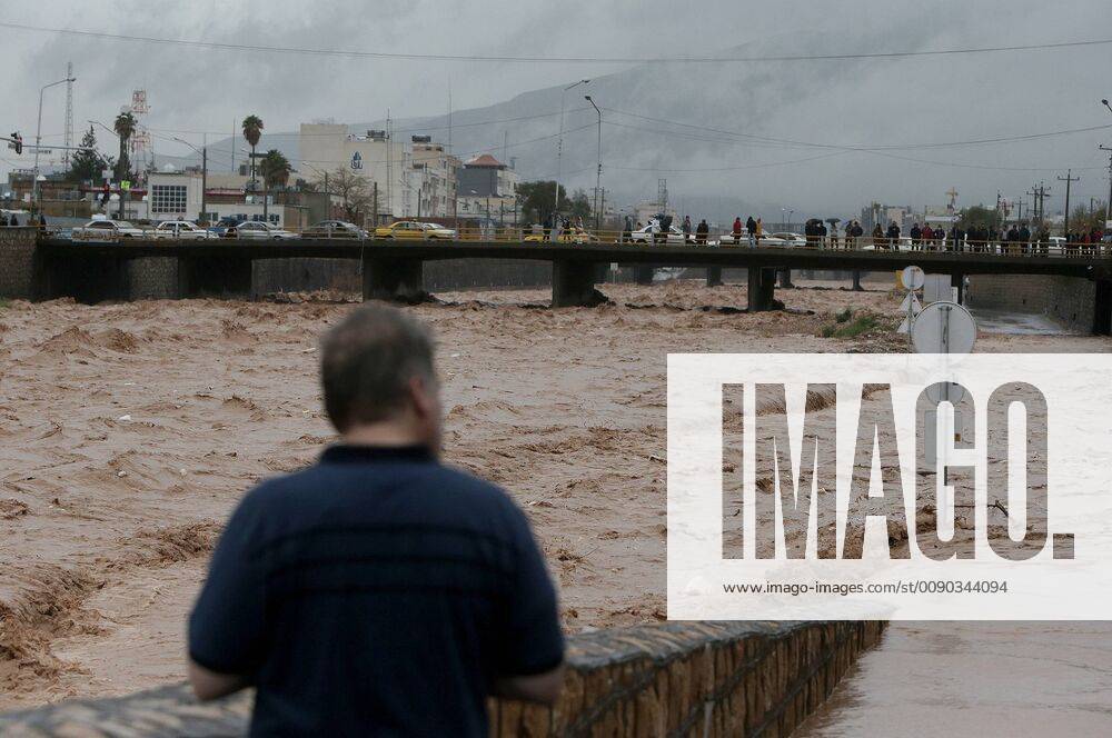 (190327) -- SHIRAZ, March 27, 2019 -- A man stands by a flooding river in Shiraz, southern Iran, March 26, 2019. At least 25 people were killed in the heavy rains and subsequent floods in Iran over the past week. ) IRAN-SHIRAZ-FLOOD-AFTERMATH AhmadxHalabisaz