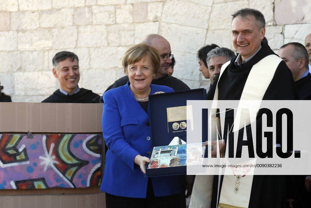 German Chancellor Angela Merkel donates a piece of Berlino wall at the Basilica of St Francis. During the ceremony, the wall was blessed for the Custos of the Sacred Convent and doves were set free Assisi March 29th 2019. St Francis Basilic. The lamp of the Peace 2019 is given to the King of Jordan. photo di Samantha Zucchi Insidefoto SamanthaxZucchi