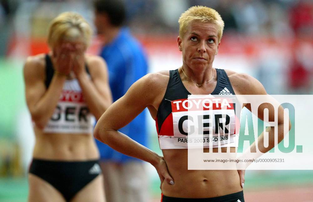 Grit Breuer (Deutschland) enttäuscht über den 4. Platz Leichtathletik WM Damen Weltmeisterschaft 2003, Nationaltrikot, 4x400m, 4 x 400 m, 400m, Meter, Staffel, Staffellauf, Vdig Einzelbild Paris Enttäuschung,