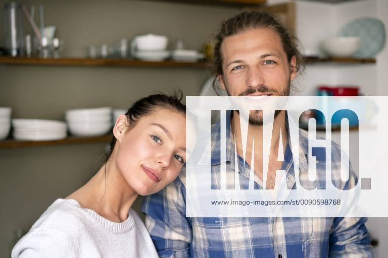 Portrait of a happy young couple at home model released Symbolfoto property released PESF01236