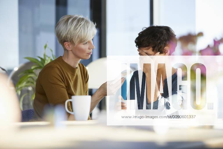 Woman consoling crying friend model released Symbolfoto property released RBF06963