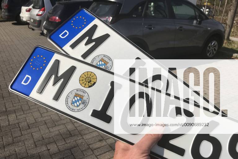 Two license plates with TUEV sticker after receipt at the KFZ Zulassungstelle Haar in the district of Munich